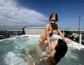 071223_two_really_hot_babes_naked_rooftop_sunbathing_followed_by_nude_jacuzzi_underwater_wet_fun_melonie_and_kristina